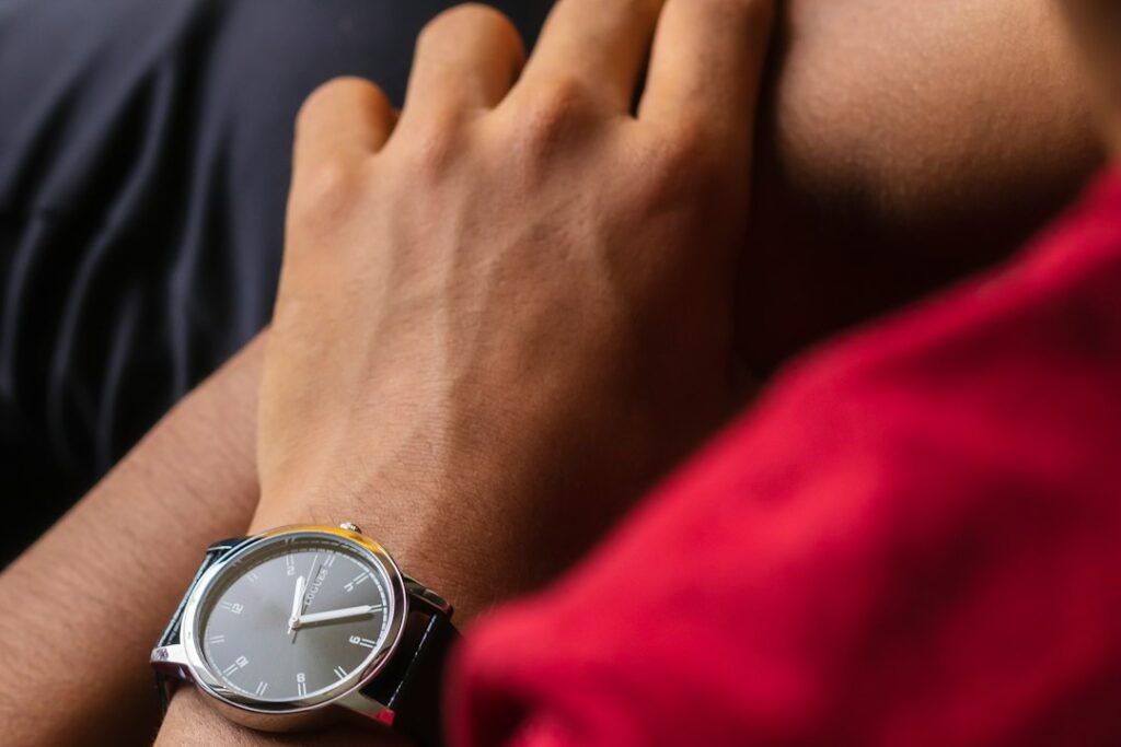An Ayurvedic practitioner examining a patient's pulse, one component of traditional diagnostic observation