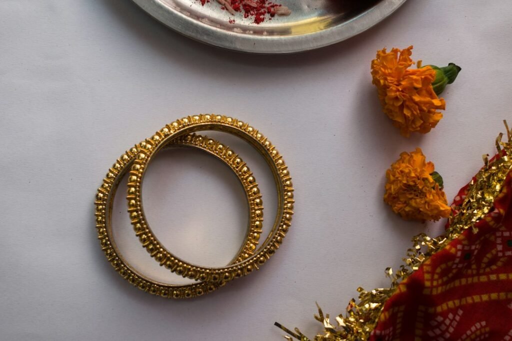 Traditional South Asian jewellery including bangles, anklets or a nose ring worn as social and cultural markers