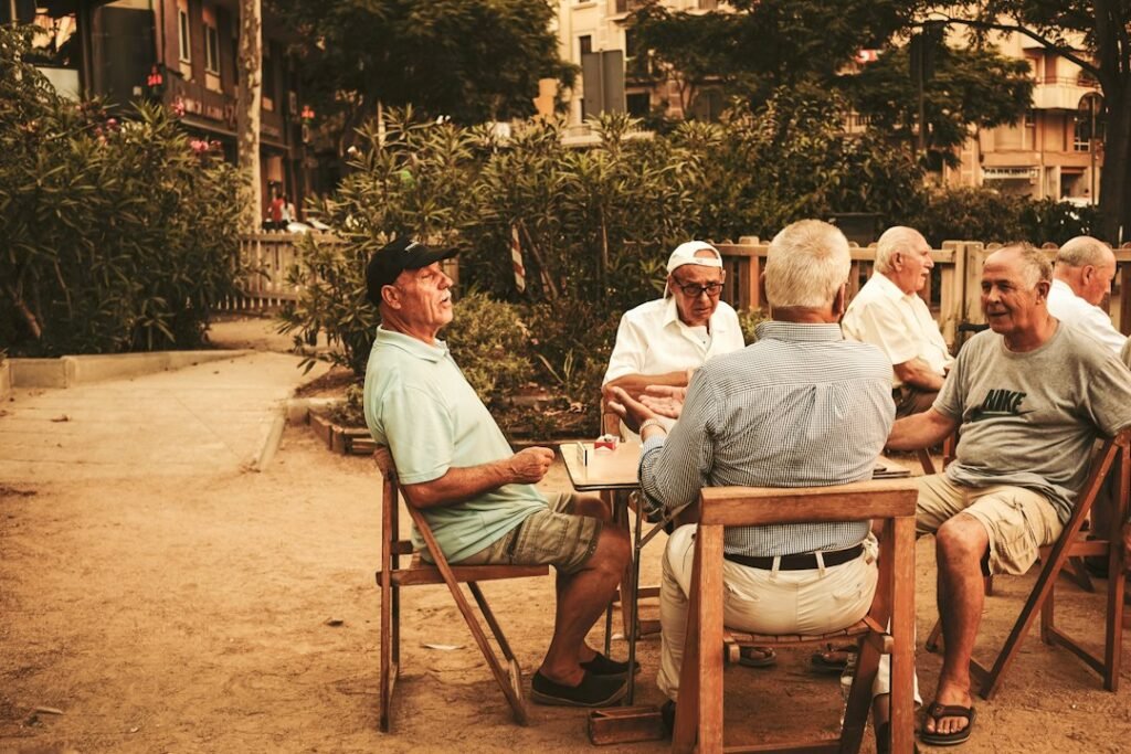 Community elders seated together for discussion and customary decision-making