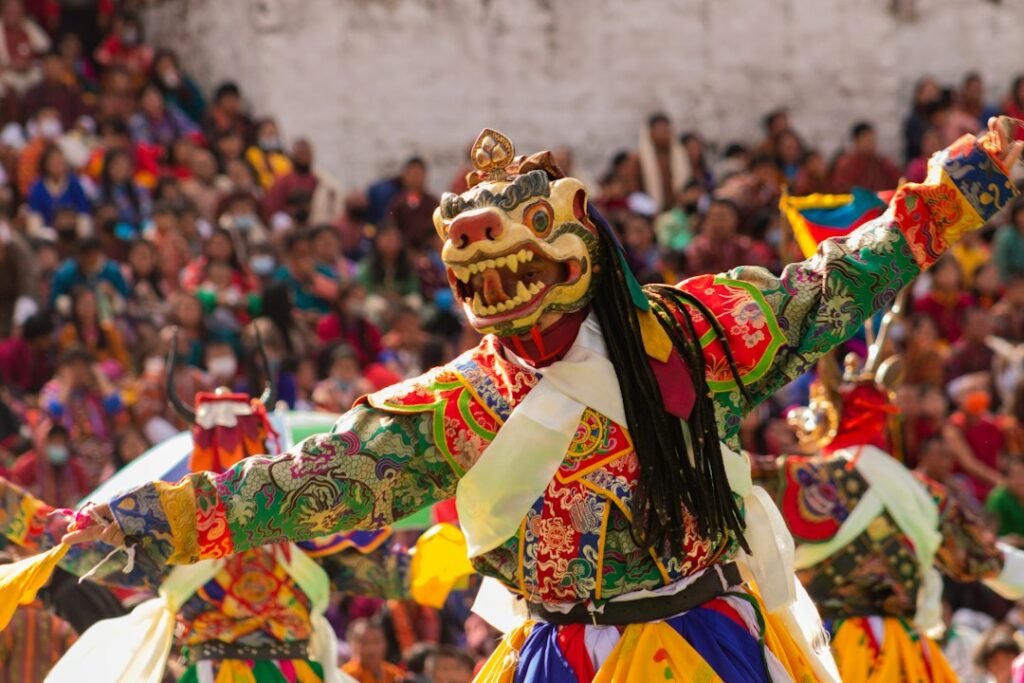 People performing a traditional communal dance in a ceremonial setting