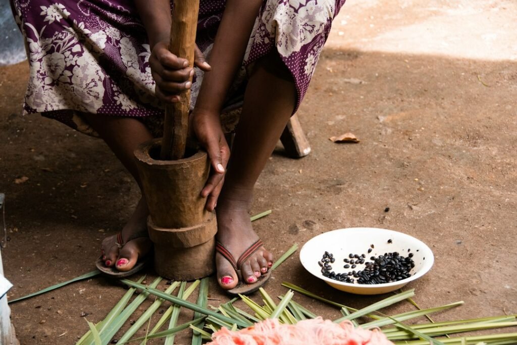 People eating a traditional meal with their hands outside the Indian context, illustrating the global practice