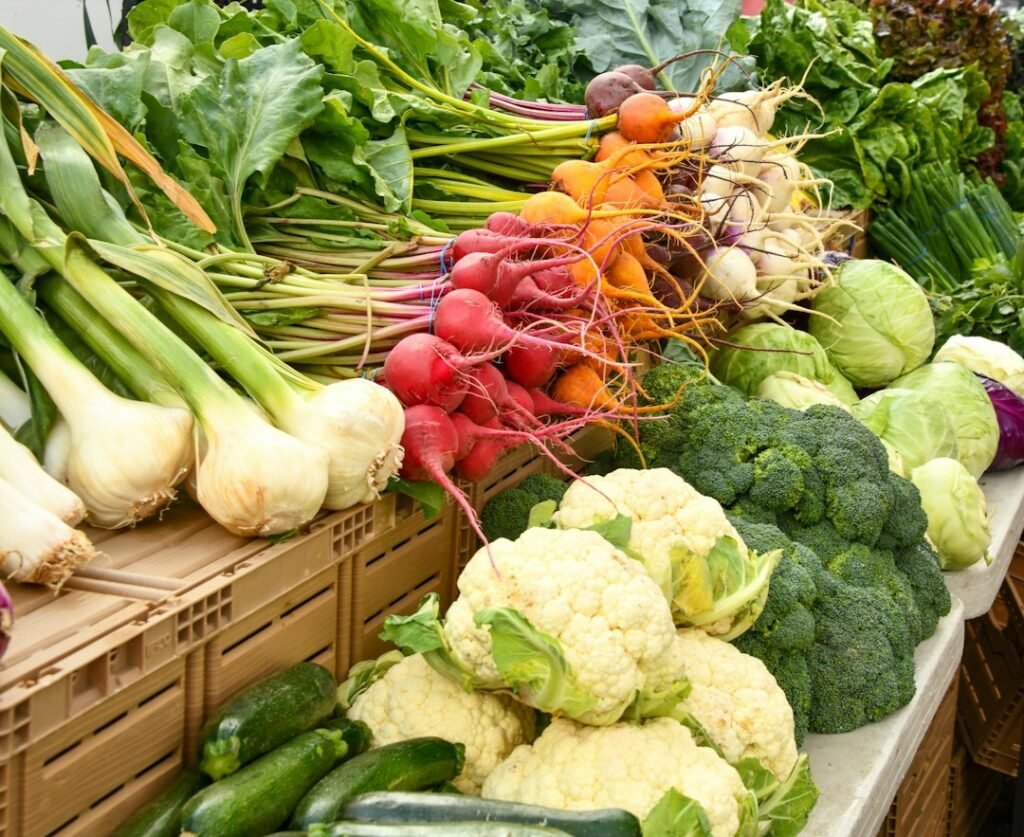 Fresh vegetables and produce displayed at a local market