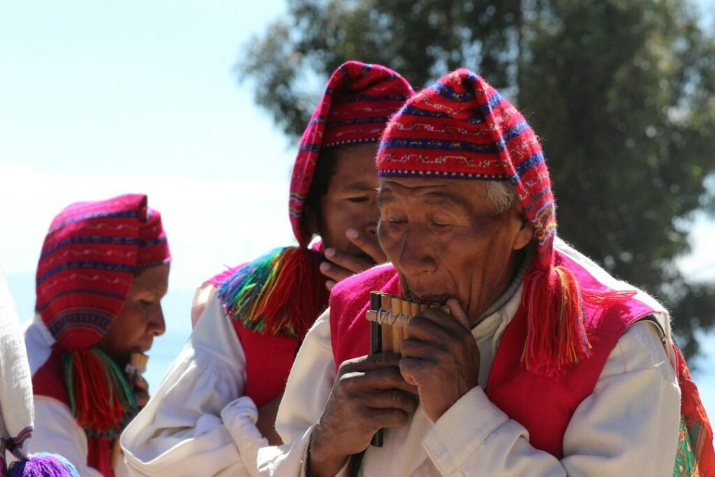 Traditional oral performance using voice, rhythm or melody to transmit memory across generations