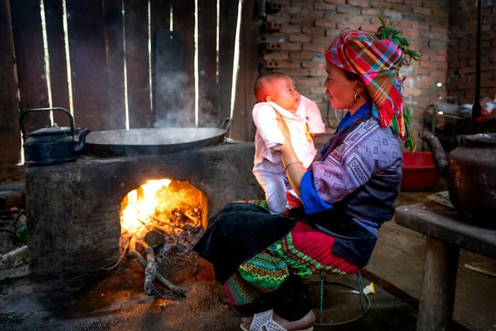 A domestic hearth with a cooking fire, illustrating the historical centre of daily household life