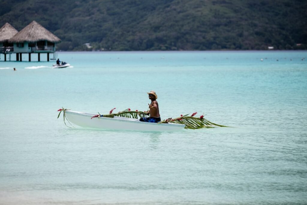 A traditional Pacific outrigger canoe representing indigenous long-distance navigation without modern instruments