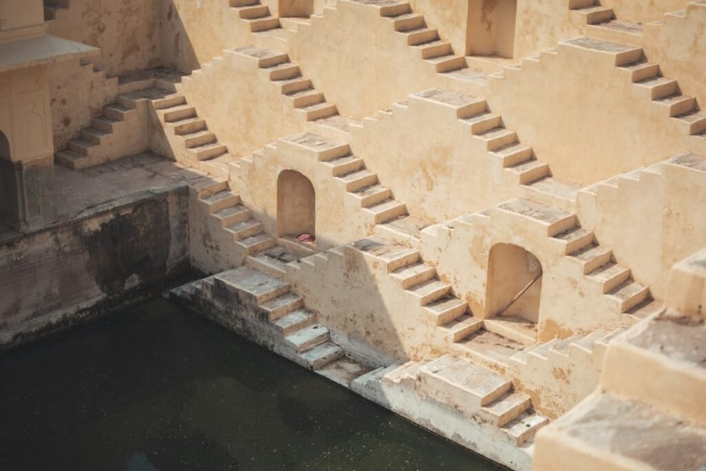 A traditional Indian water source used collectively by a community and embedded in local rules and practice